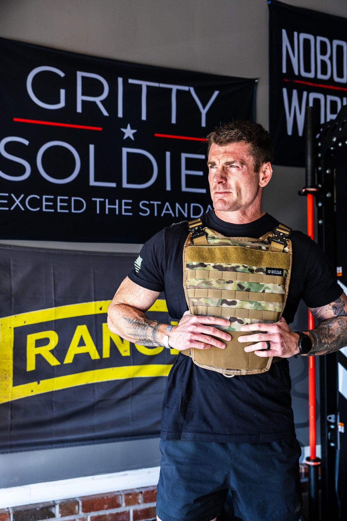 Dan Fahey of Gritty Soldier wearing the Battle Bunker Hybrid Weight Vest MK2 in camo