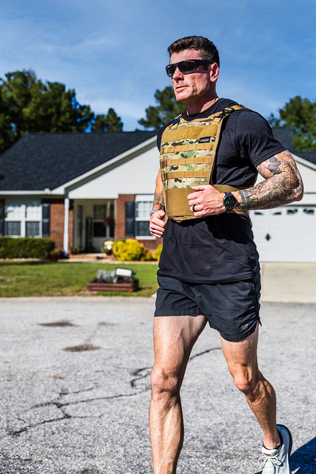 Dan Fahey of Gritty Soldier running in the Battle Bunker Hybrid Weight Vest MK2