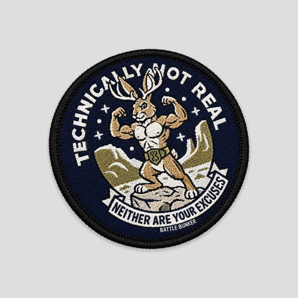 Technically Not Real Patch, round navy patch with flexing jackalope, Neither Are Your Excuses