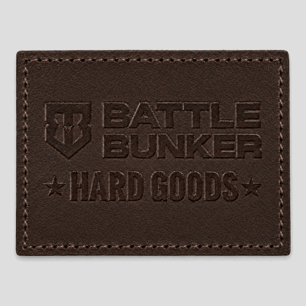 Hard Goods Leather Patch, brown debossed leather-style patch with shield logo