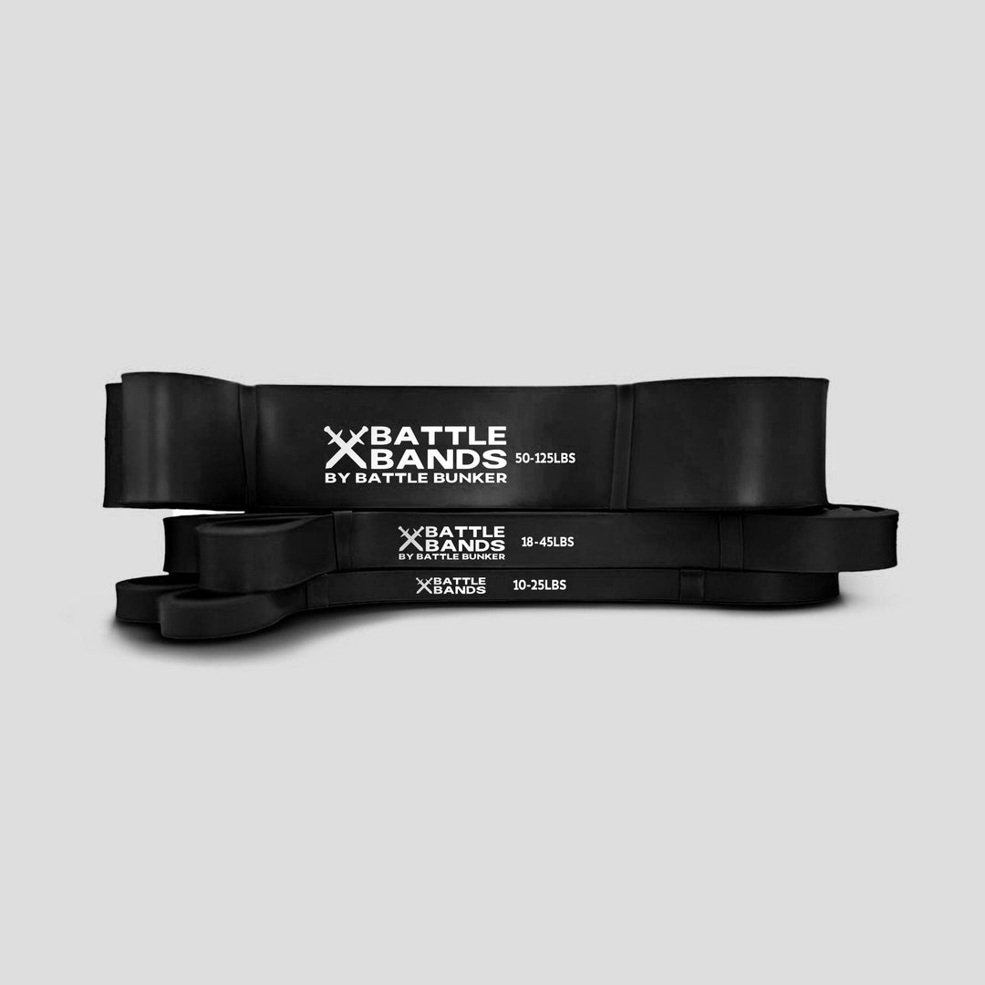 Set of black resistance bands labeled Battle Bands by Battle Bunker with varying resistance levels