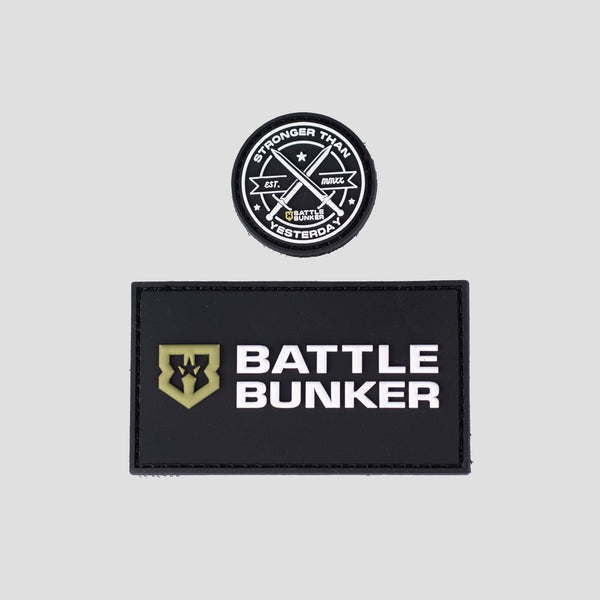Battle Bunker black rectangular patch with logo and round patch reading stronger than yesterday with crossed swords