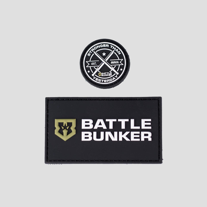 Battle Bunker black rectangular patch with logo and round patch reading stronger than yesterday with crossed swords