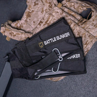 Black Battle Bunker tactical gear on digital camo military vest in close-up
