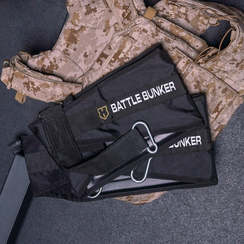 Black Battle Bunker tactical gear on digital camo military vest in close-up