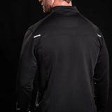 Man wearing black Battle Bunker jacket with reflective stripes on shoulders against black background