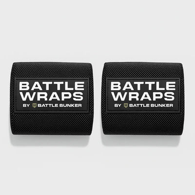 Pair of black Battle Wraps by Battle Bunker fitness wrist wraps on white background