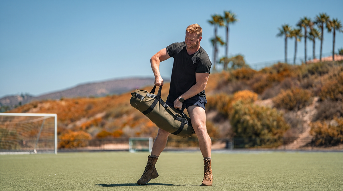 Austen training with a Battle Bunker sandbag