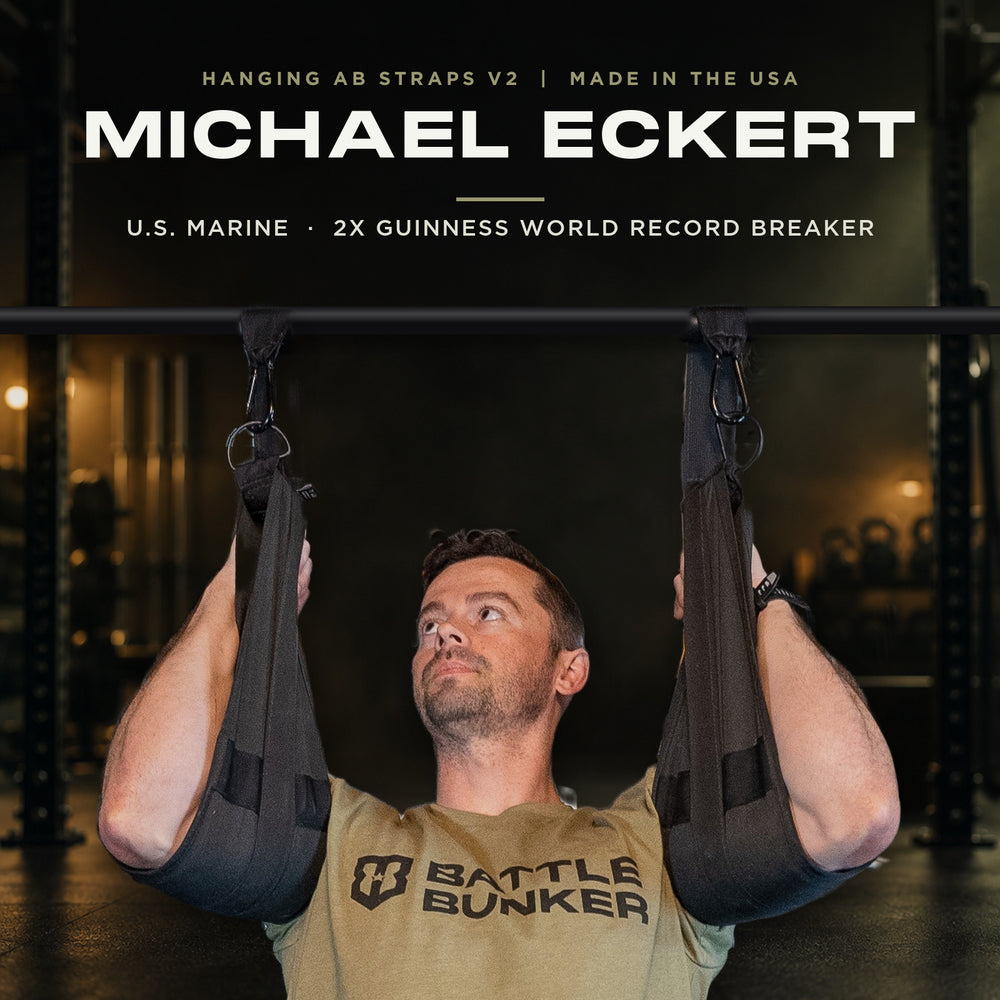 Michael Eckert, U.S. Marine and 2x Guinness World Record breaker, training in Battle Bunker Hanging Ab Straps V2 on a pull-up bar
